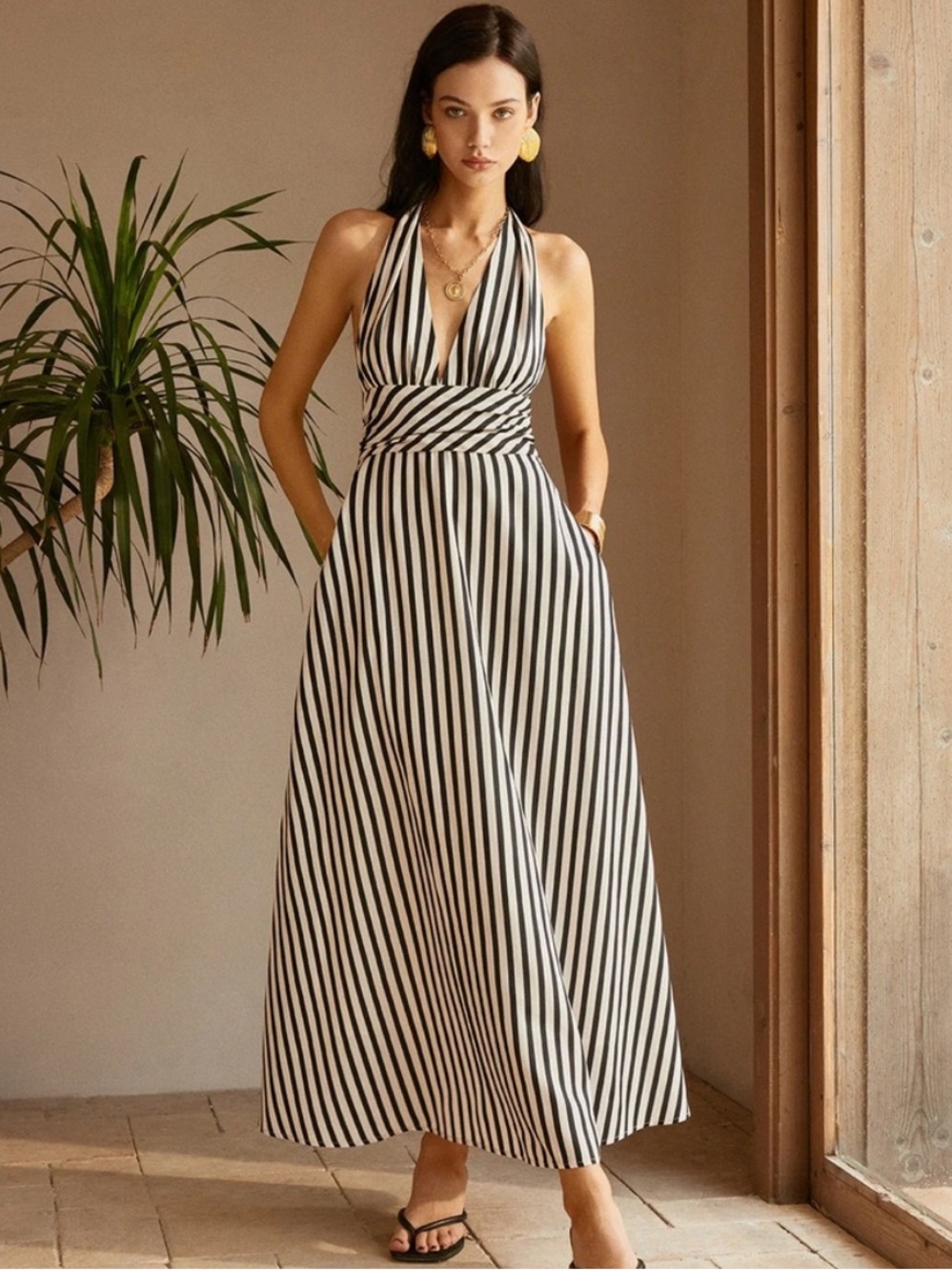 Commense Black & White Vertical-Stripe Halter Maxi Dress